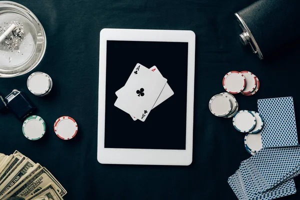 Live Bandar Poker table at kdk batavia with dealer and player cards displayed